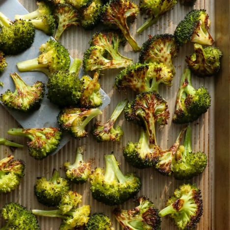 roasted broccoli on a baking sheet.