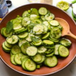 asian cucumber salad tossed with sesame lime dressing and fresh herbs.