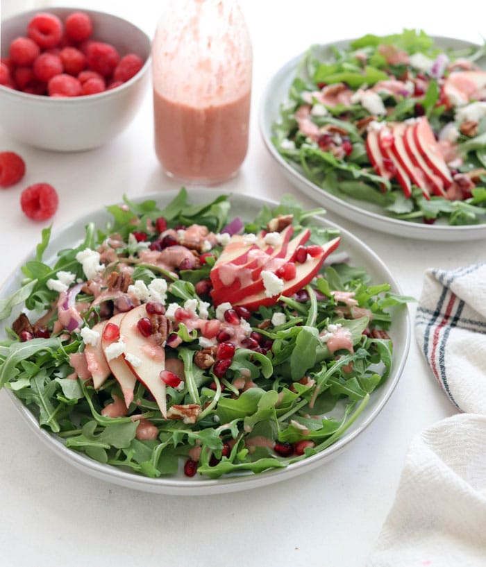 arugula salad with fruit on top