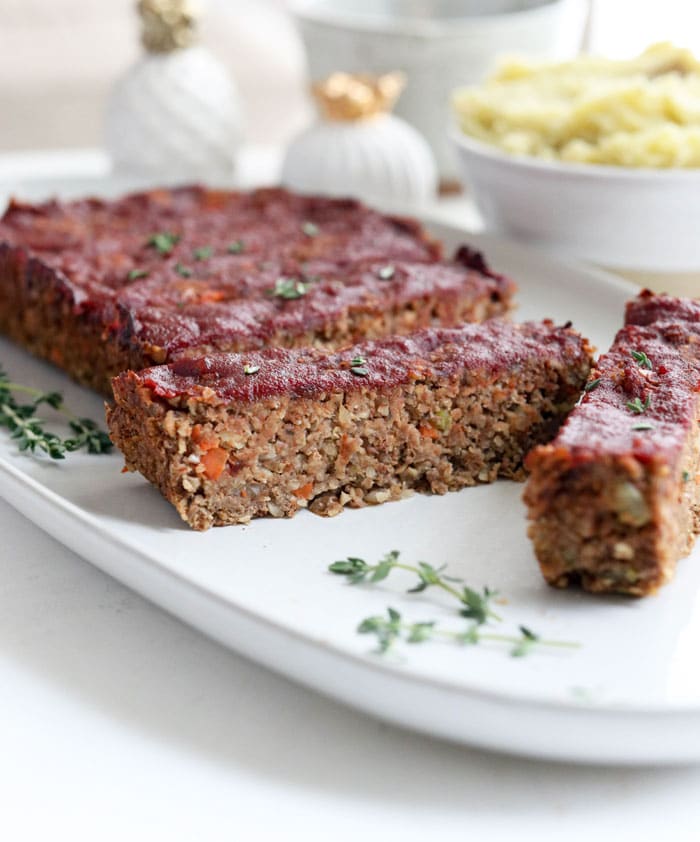 vegan meatloaf sliced on a plate