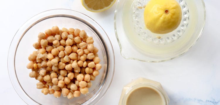 chickpeas in a bowl with juiced lemon