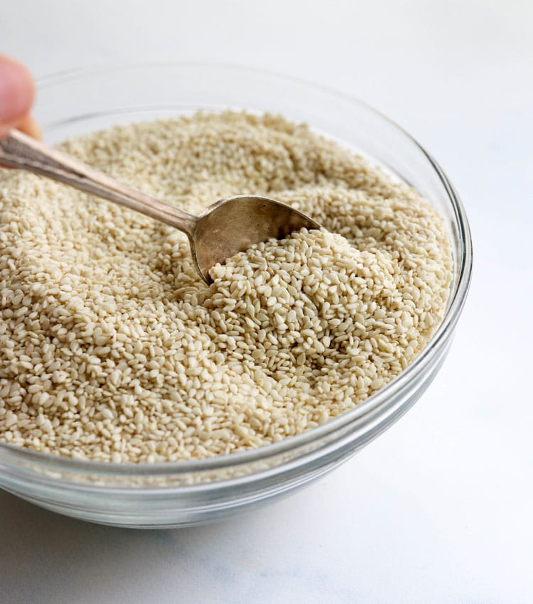 hulled sesame seeds in glass bowl