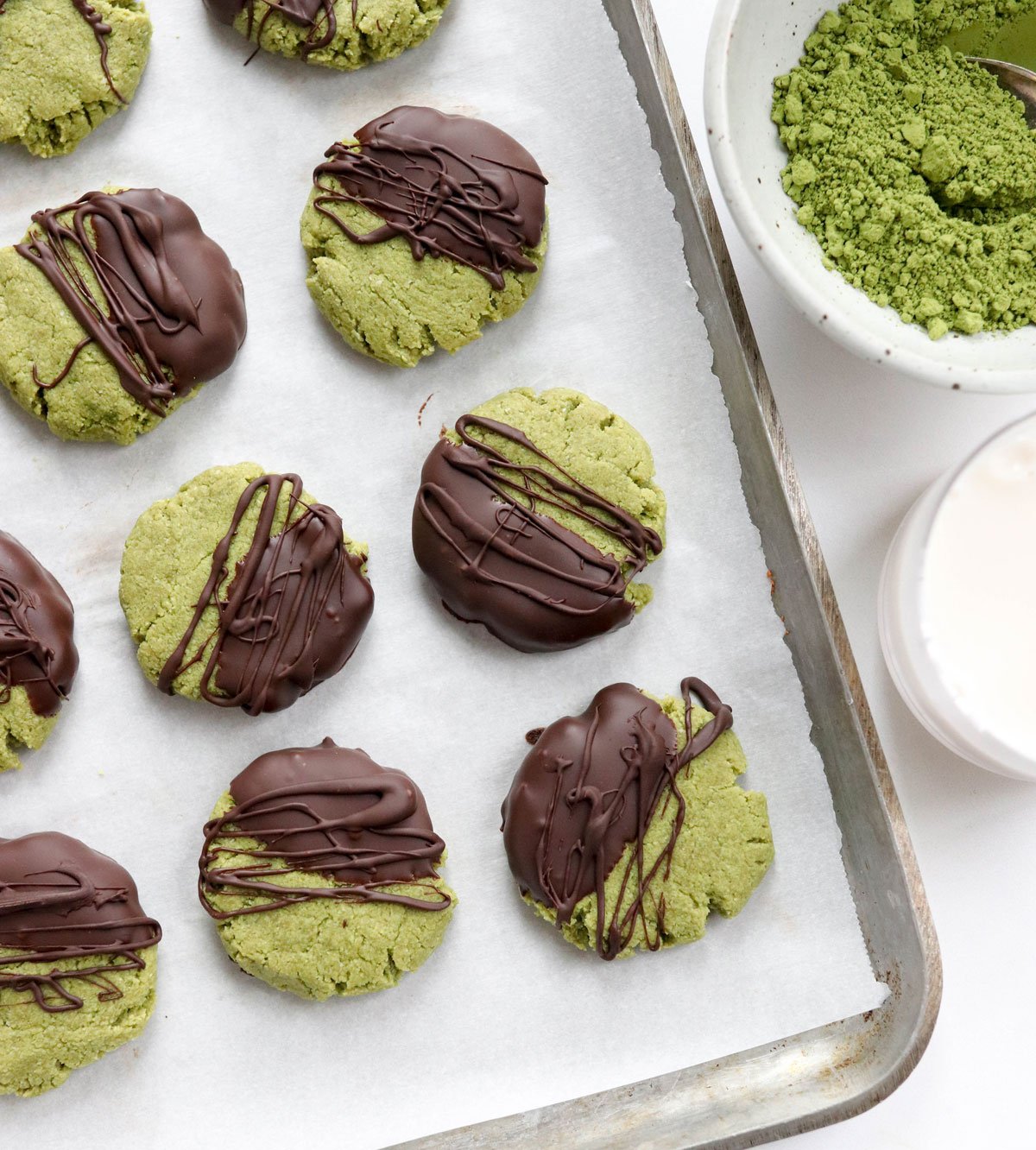 matcha cookies on baking sheet