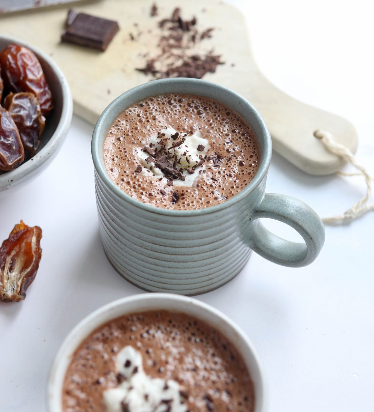 hot chocolate with coconut whipped cream and chocolate shavings