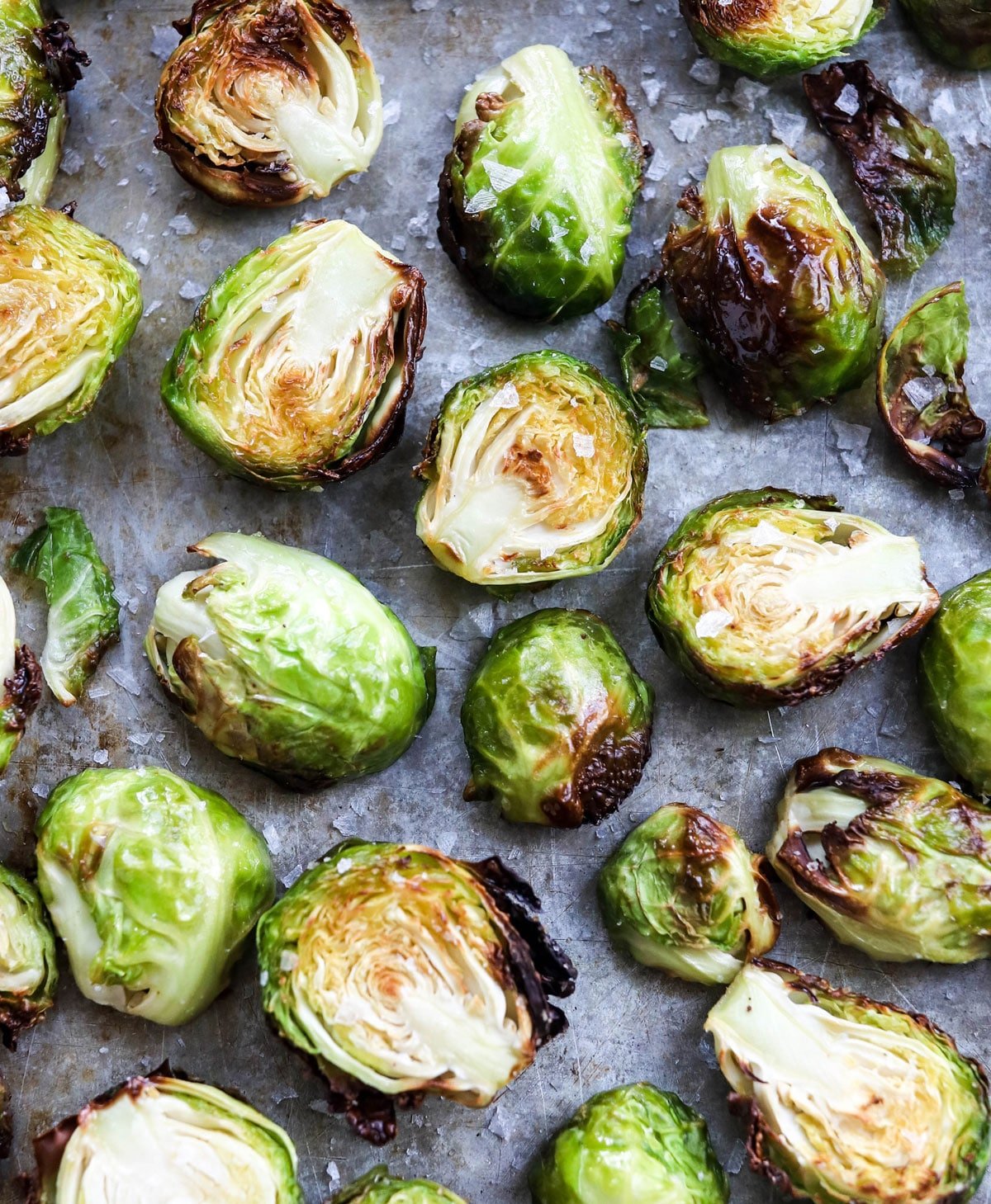 air fryer brussels sprouts on a pan with salt