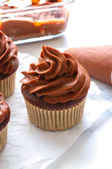 chocolate frosting recipe without powdered sugar on a cupcake.