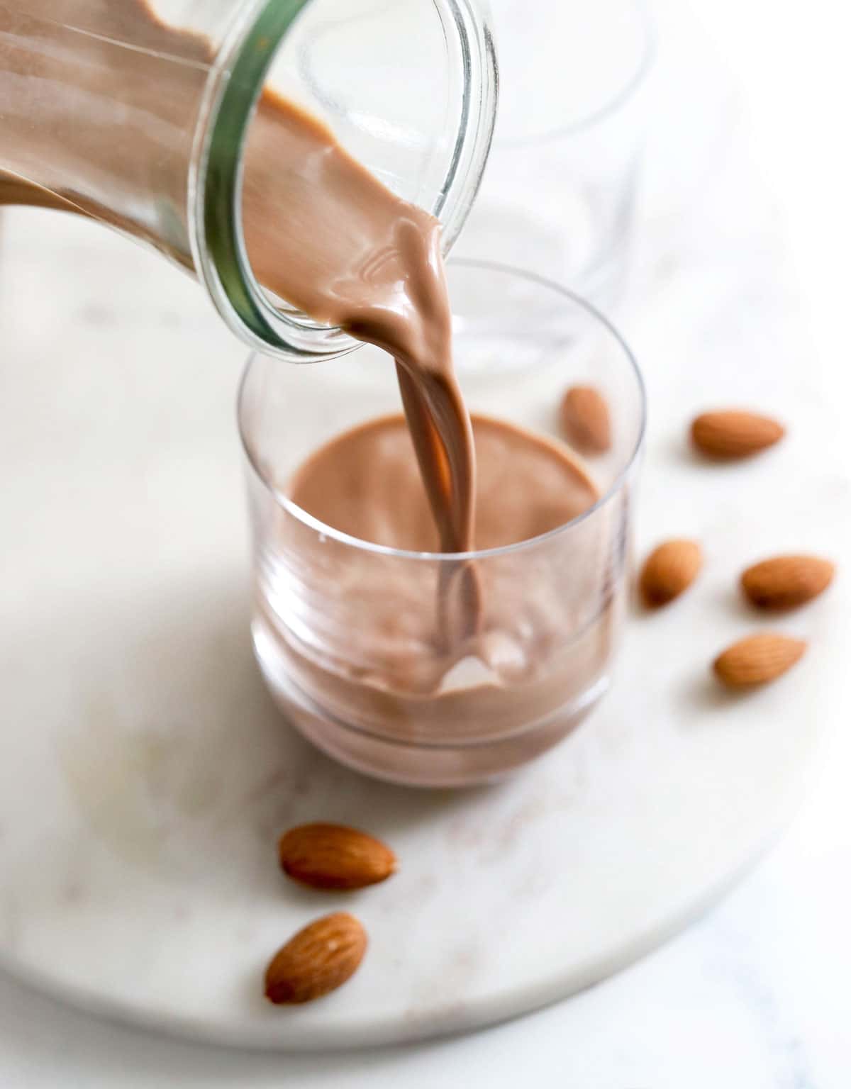 chocolate almond milk poured into glass