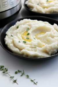 fluffy mashed potatoes in front of instant pot