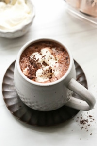 date sweetened hot chocolate in white mug.