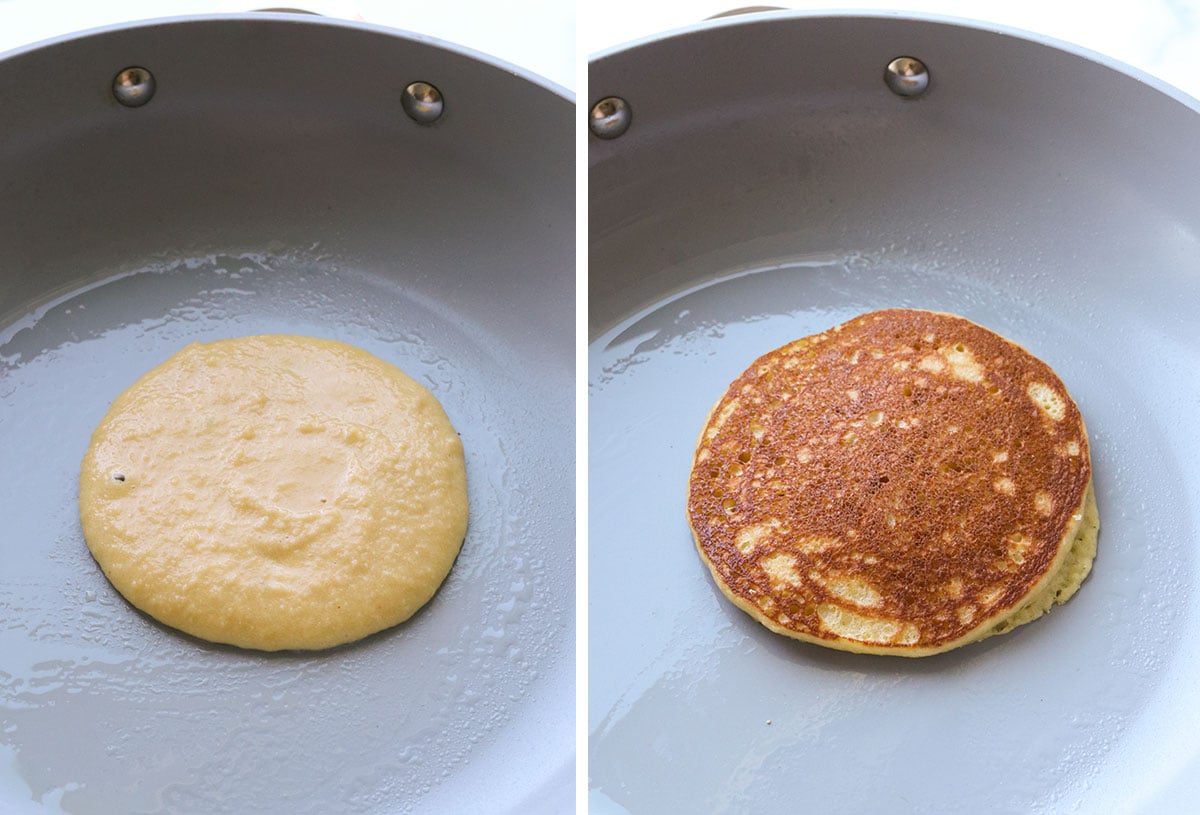 pancake batter on a gray pan and flipped to show cooked side.