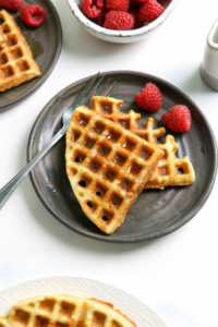 coconut flour waffles on two plates