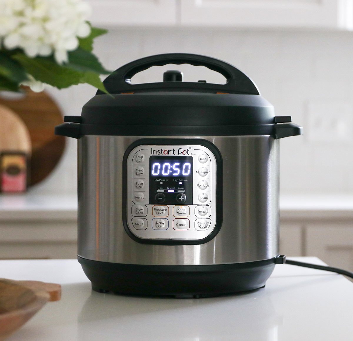 Instant pot set to cook on a counter for 50 minutes.