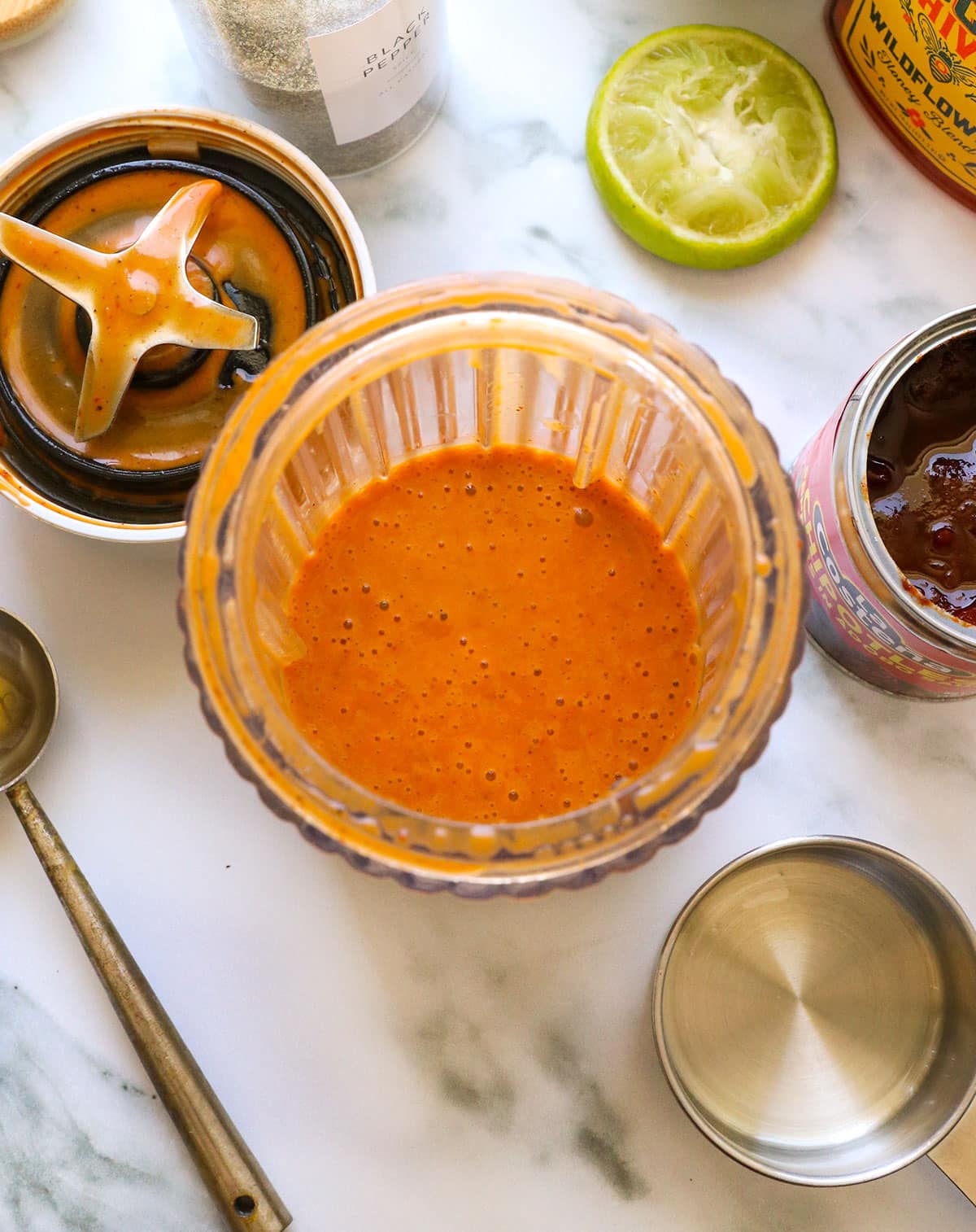 honey chipotle vinaigrette blended in a small blending container.