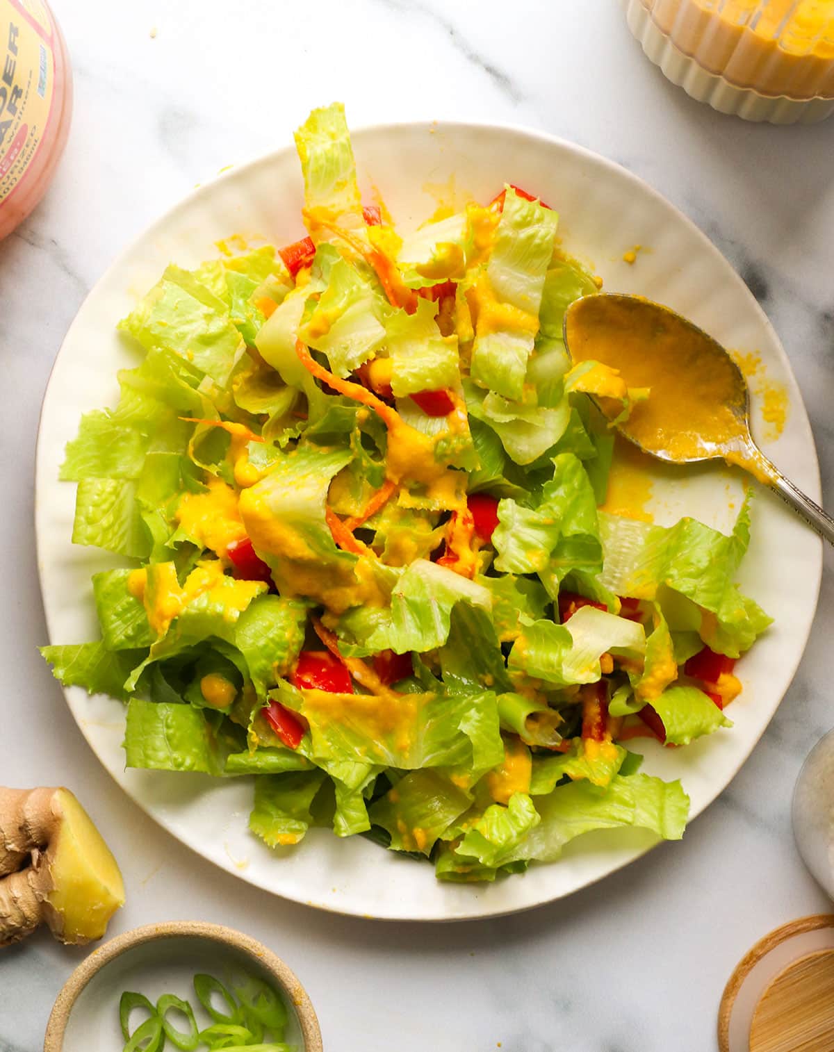 carrot ginger dressing served over a romaine salad.