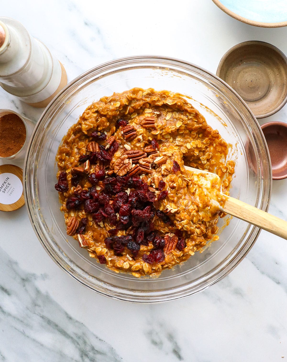 dried cranberries and pecans added to the pumpkin oatmeal mixture.