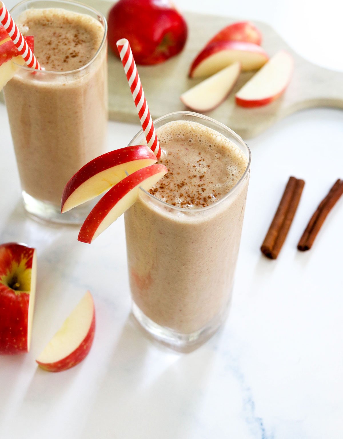 apple smoothie with sliced apples on top