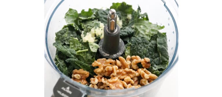 kale pesto ingredients in food processor
