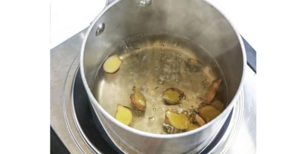 simmer ginger tea in pot