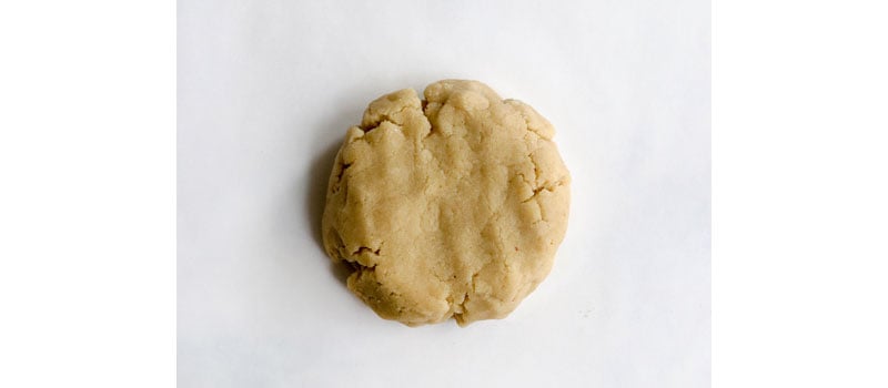 ball of almond flour dough on parchment