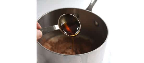 adding maple syrup to taste