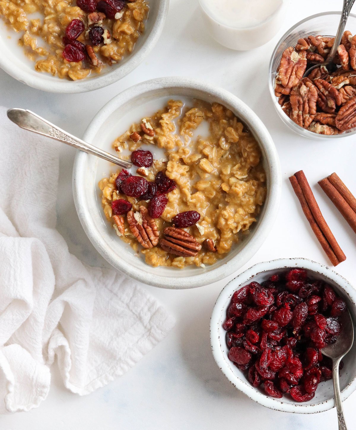 pumpkin oatmeal bowls with dried cranberries