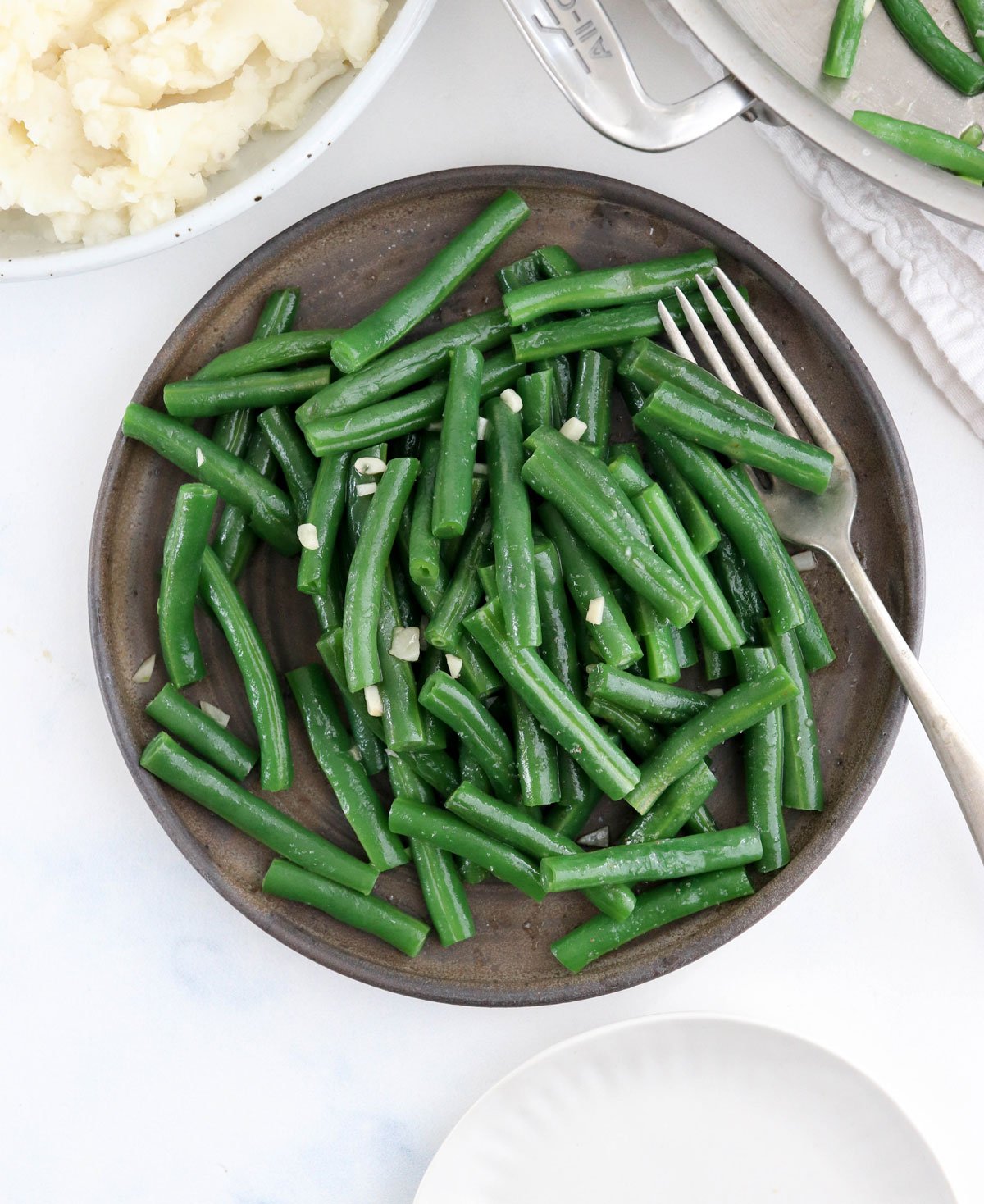 sauteed green beans on plate overhead