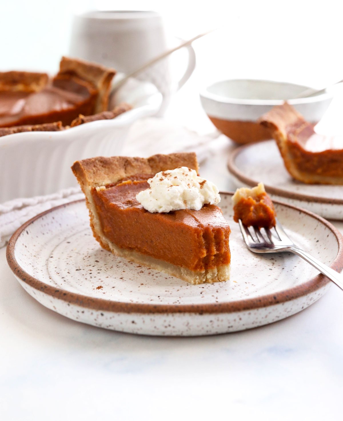 sweet potato pie slice with whipped cream