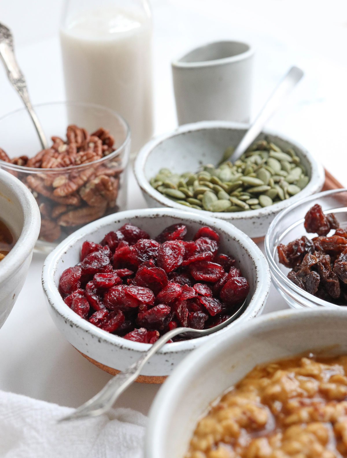 topping options in small white bowls