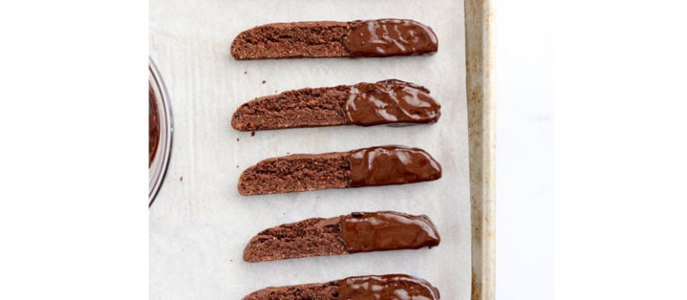 chocolate dipped biscotti on pan