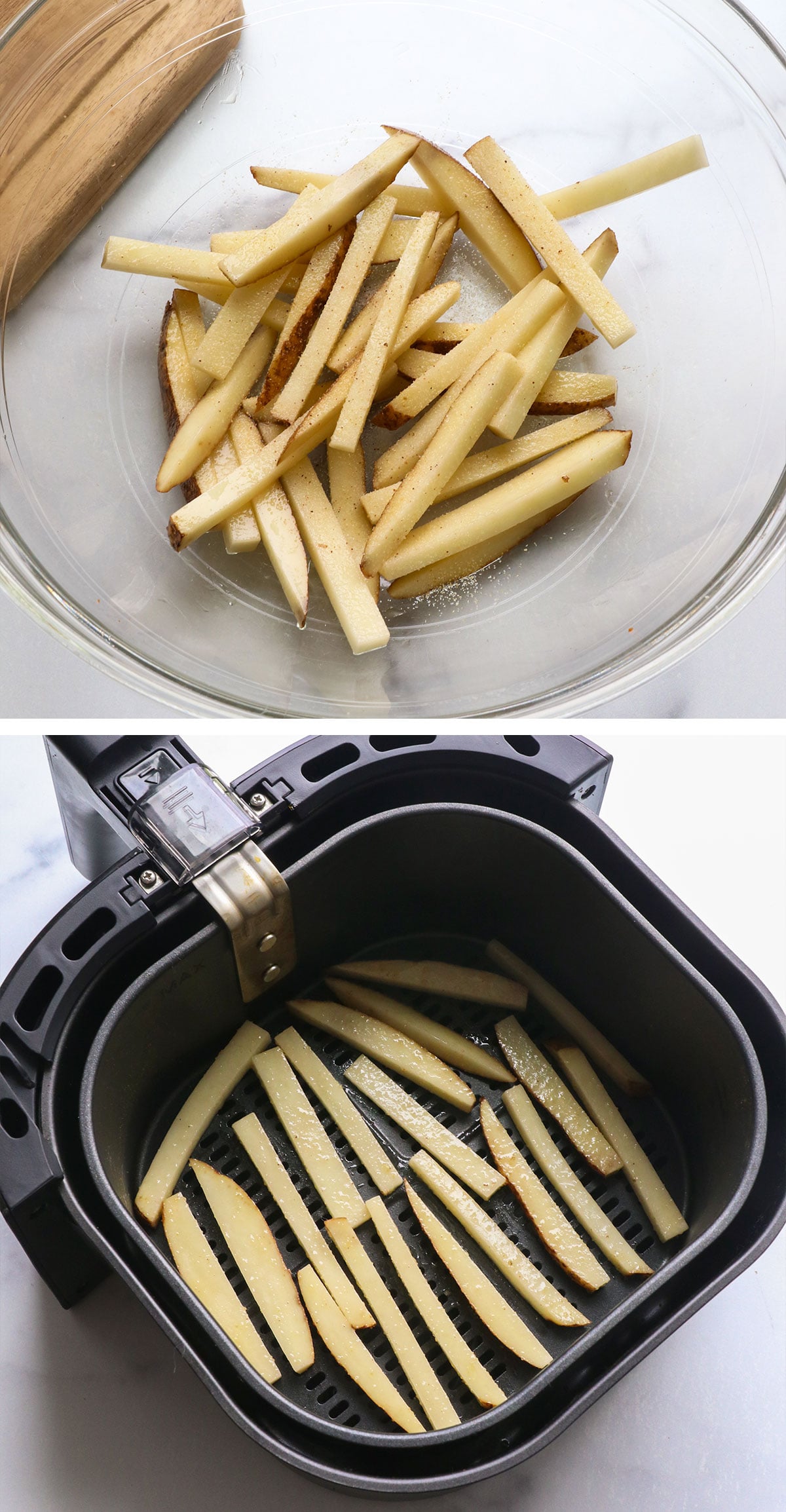 fries seasoned in a bowl then arranged in an air fryer basket.