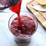 beet juice poured into a glass for serving.