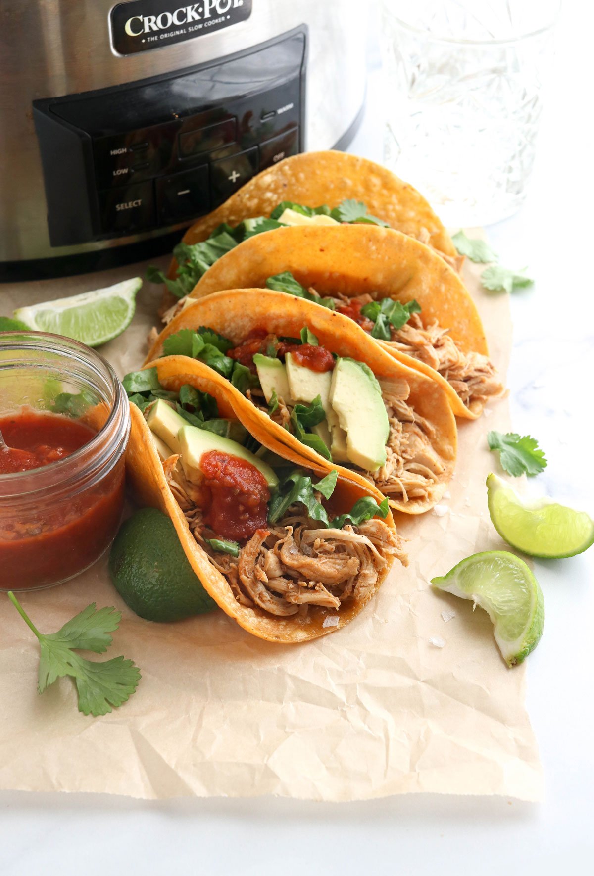 chicken tacos in front of slow cooker