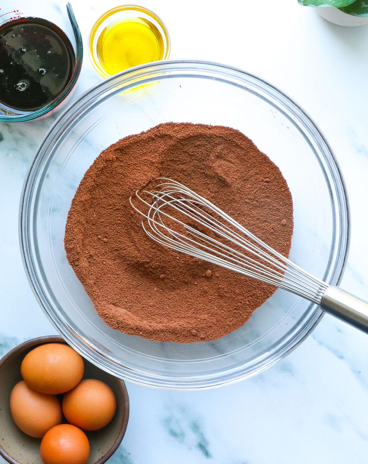 dry ingredients whisked together in a glass bowl.