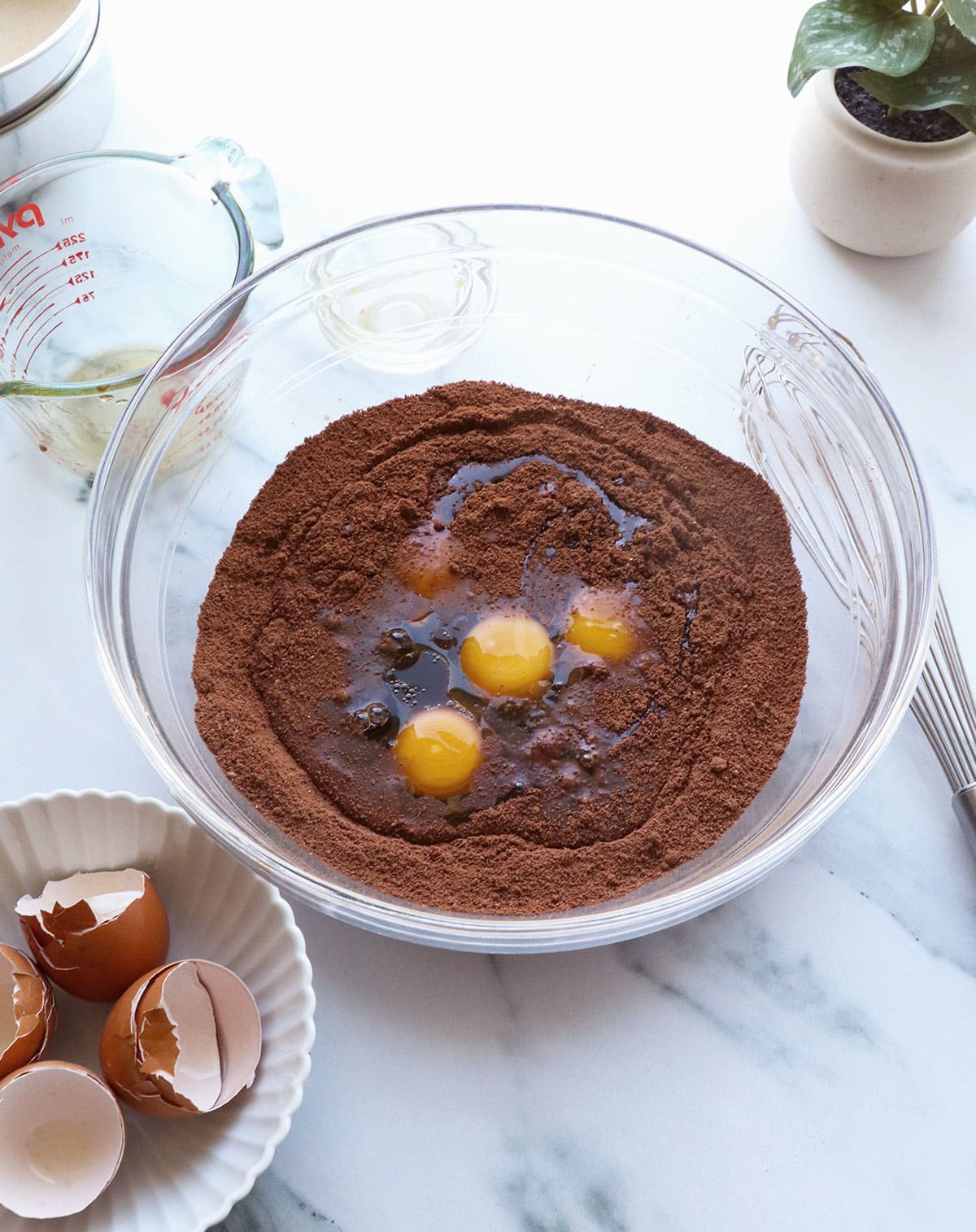 eggs, maple syrup, and olive oil added to the dry ingredients.
