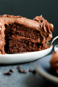 chocolate almond flour cake on serving plate