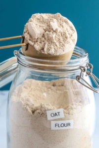 oat flour on blue background