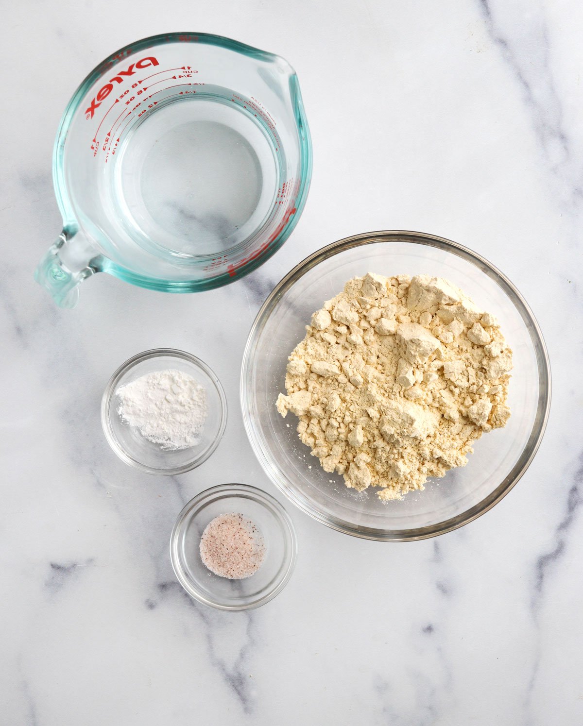 chickpea pancake ingredients on marble surface