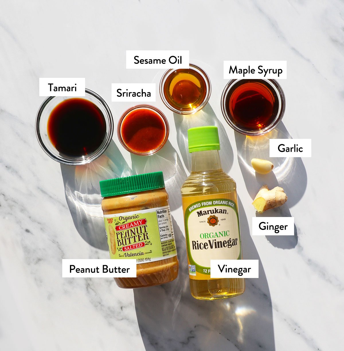 peanut butter, sriracha, toasted sesame oil, tamari, and vinegar labeled.
