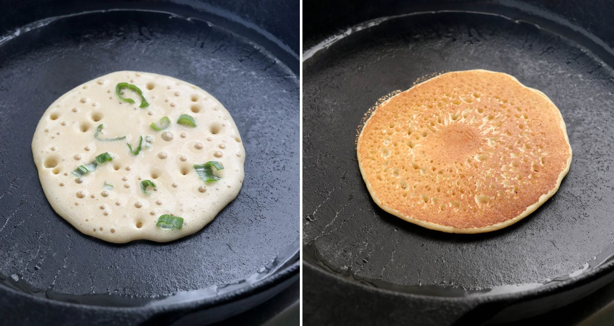 chopped green onions added to pancake and flipped