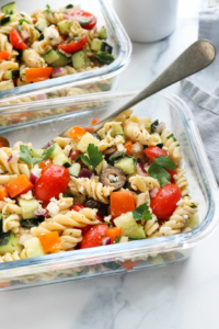 greek pasta salad in glass meal prep container