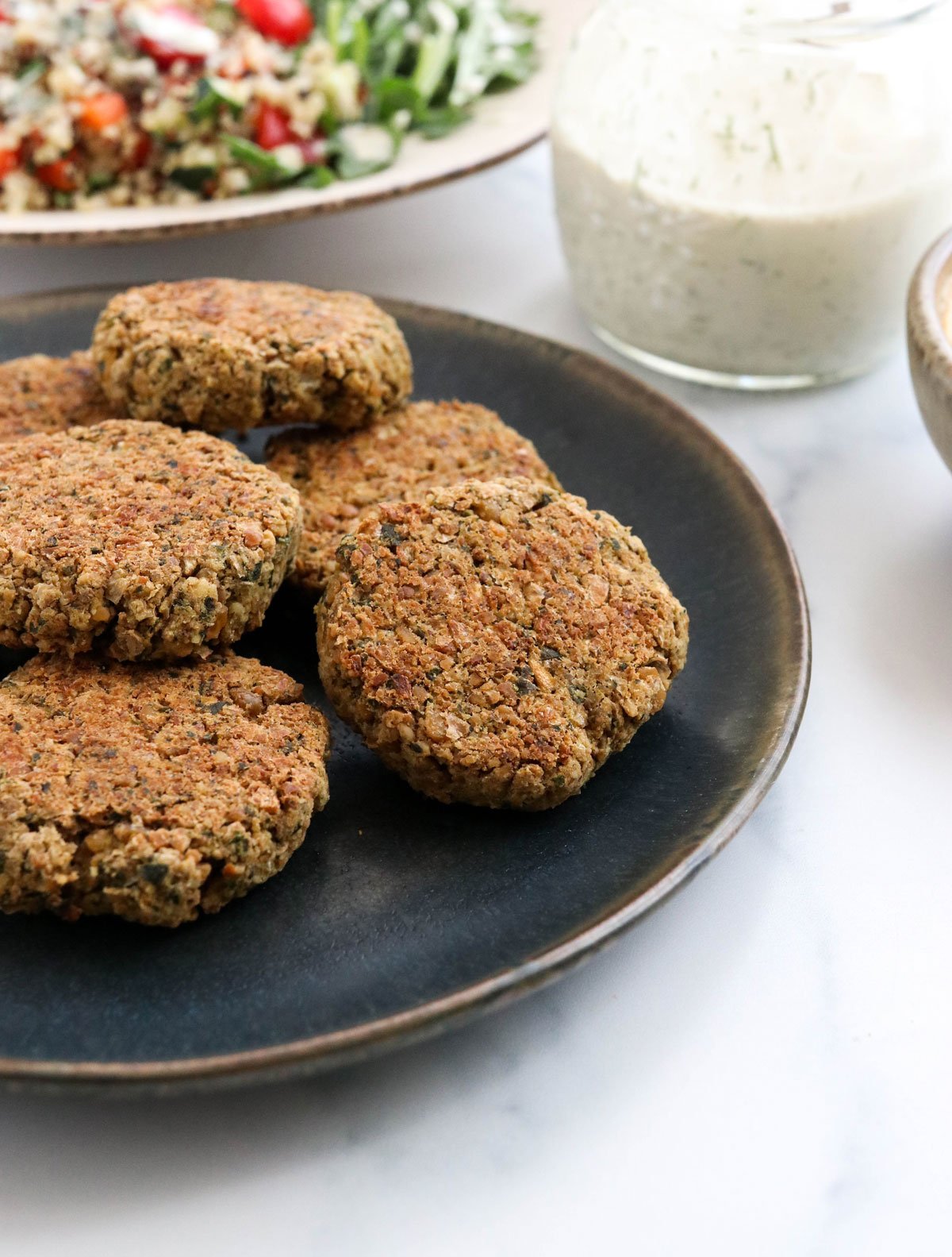 baked falafel on black serving plate