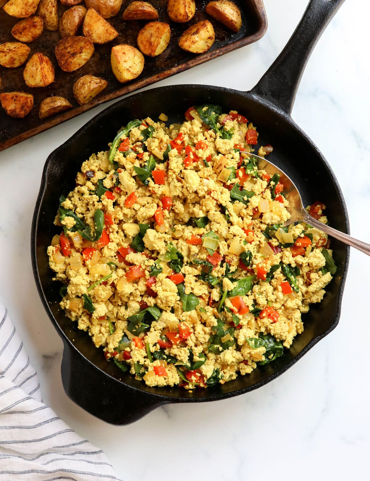 scrambled tofu in black skillet