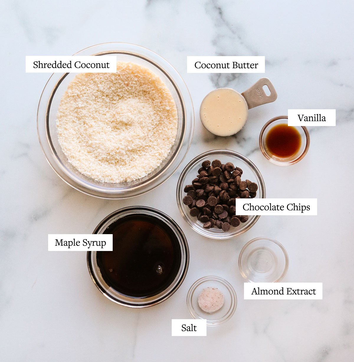 coconut macaroon ingredients labeled on a white surface.