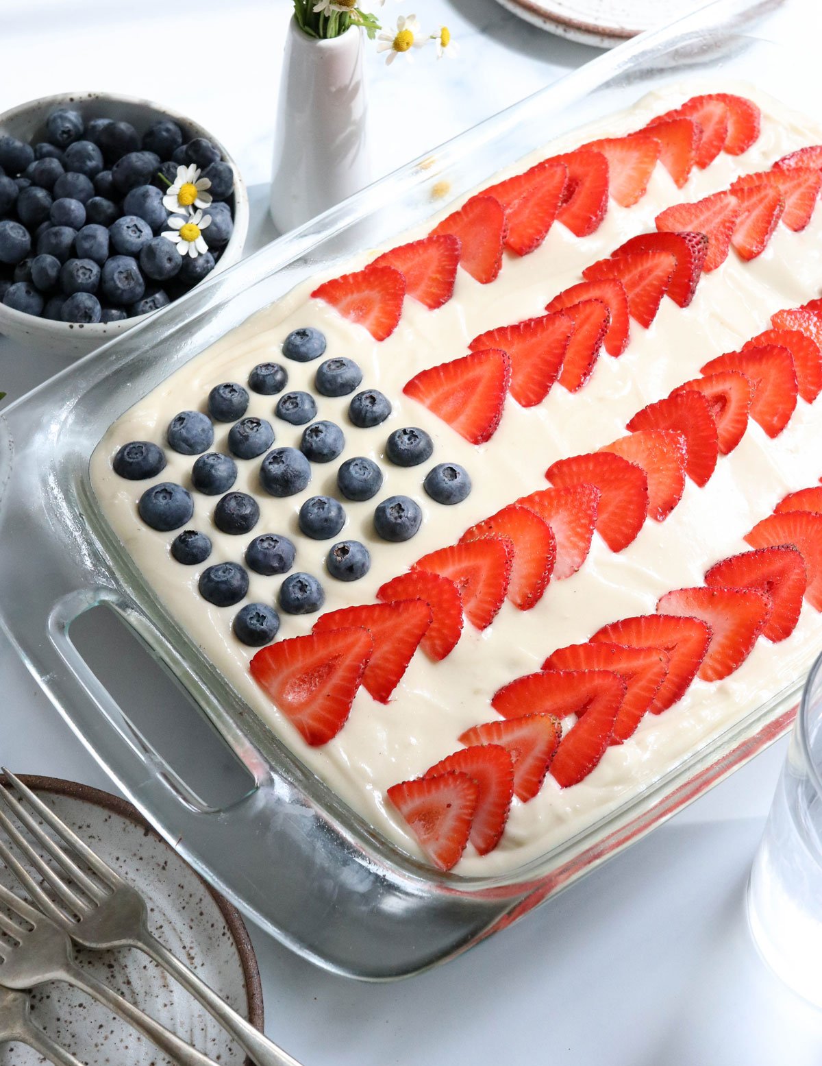 oat flour flag cake topped with berries