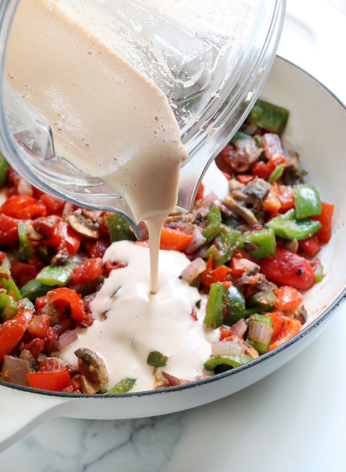 vegan cream sauce poured into skillet