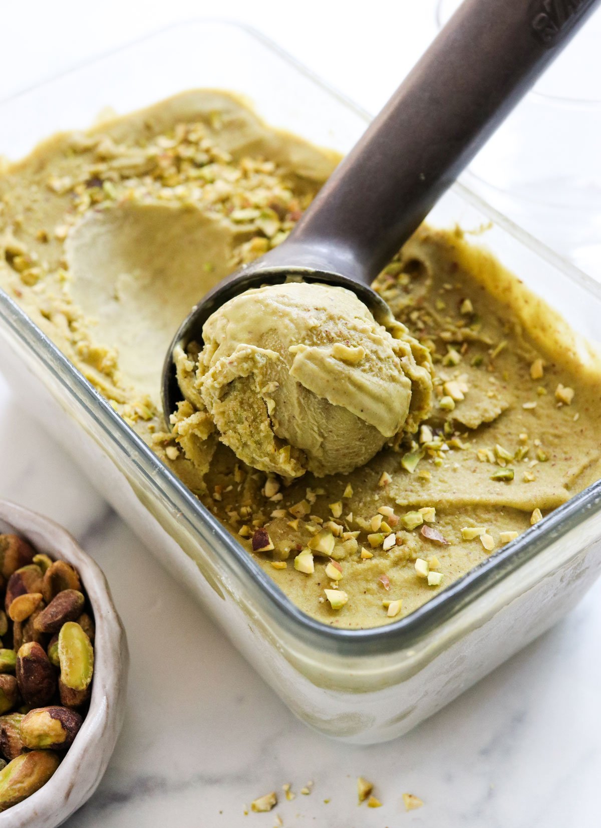 vegan pistachio ice cream with scoop