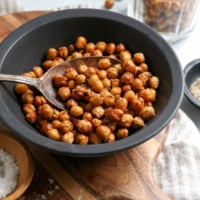 air fryer chickpeas in black bowl with spoon