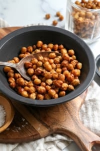 air fryer chickpeas in black bowl with spoon