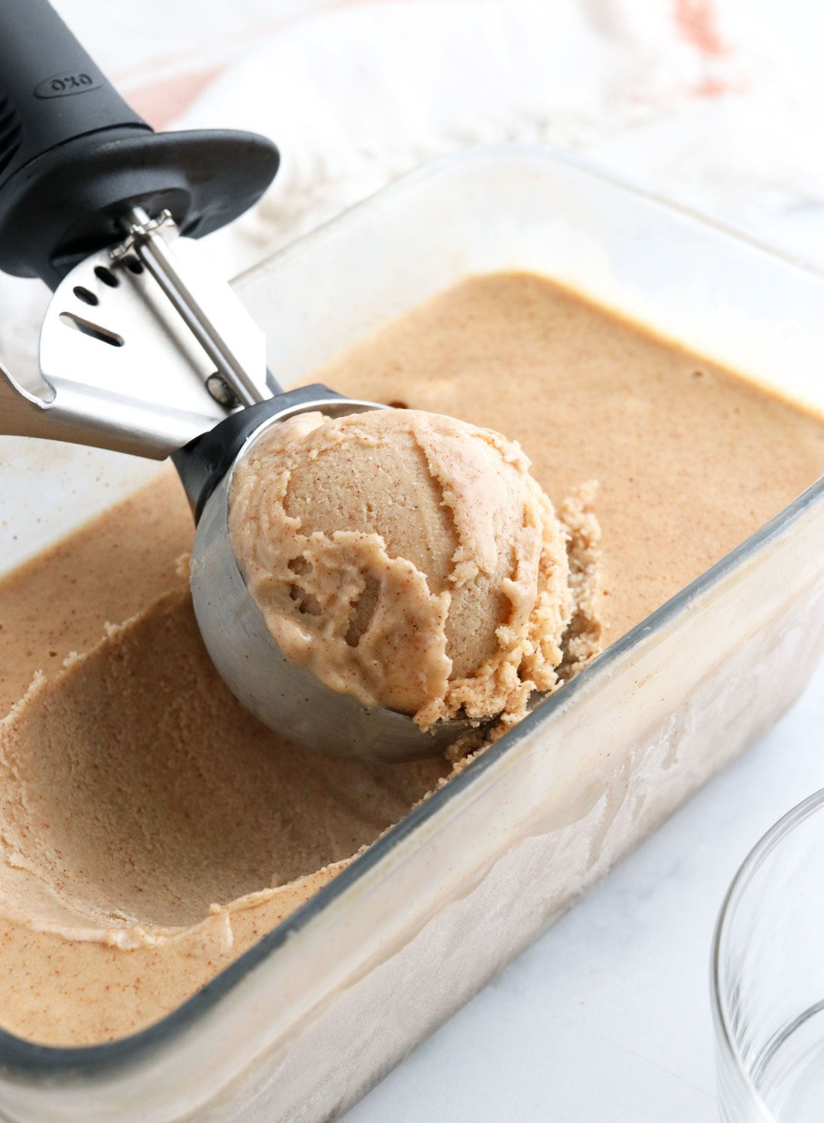 almond milk ice cream scooped from pan