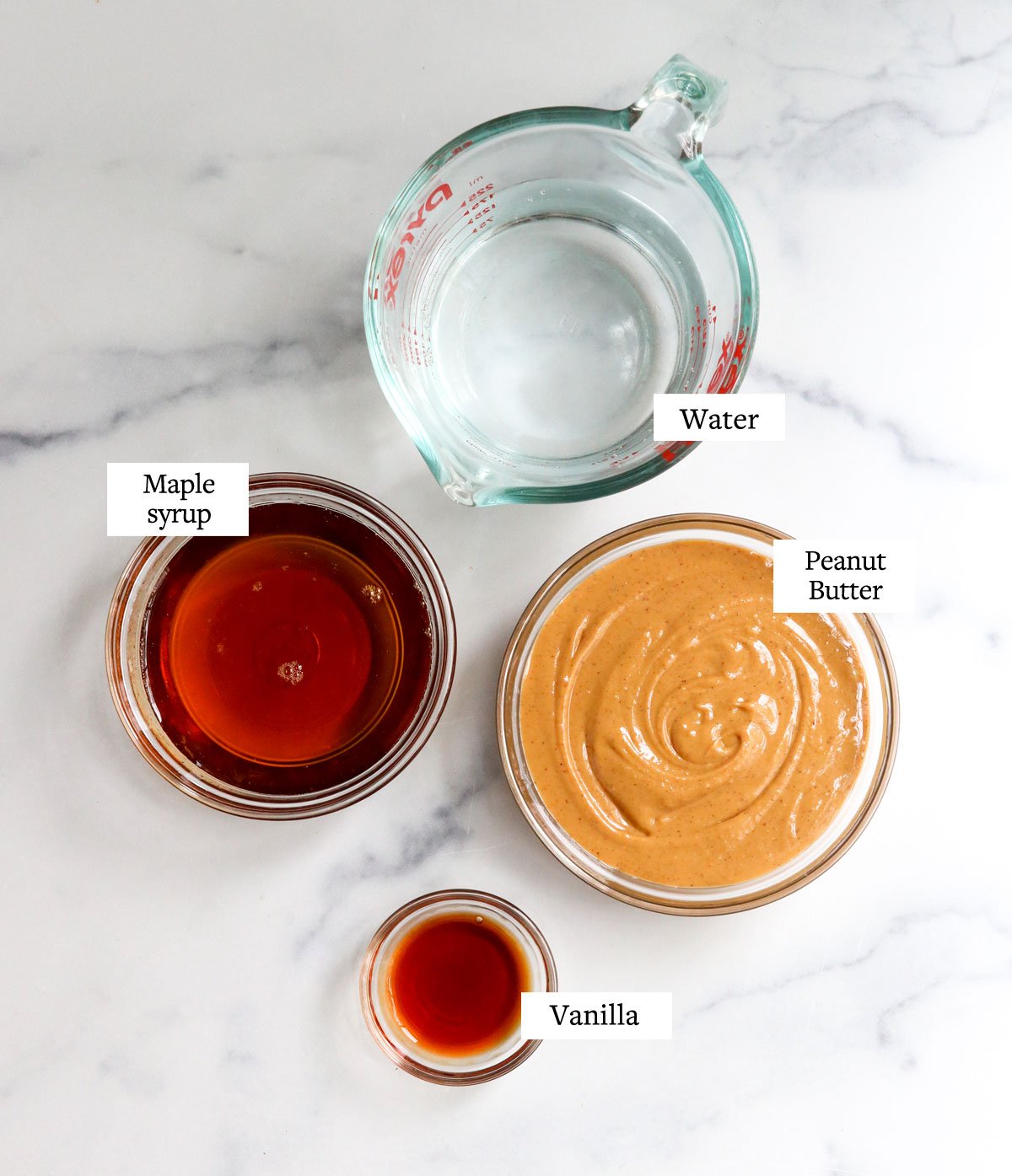 peanut butter ice cream ingredients in glass bowls